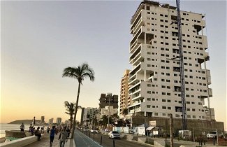Foto 1 - Central 102 Apartments