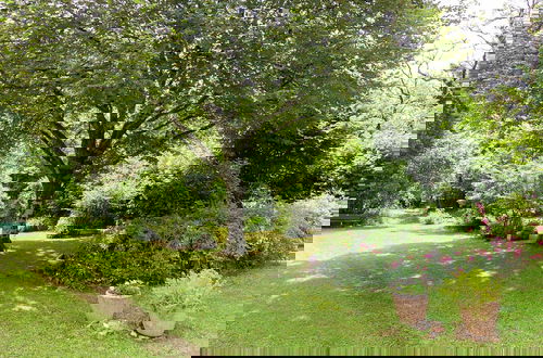 Photo 38 - Spacious Farmhouse With Private Heated Pool in a Rustic Garden