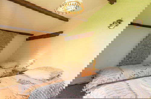 Photo 12 - Spacious Farmhouse With Private Heated Pool in a Rustic Garden