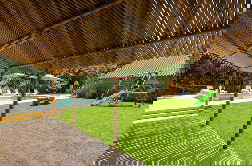 Photo 42 - Spacious Farmhouse With Private Heated Pool in a Rustic Garden