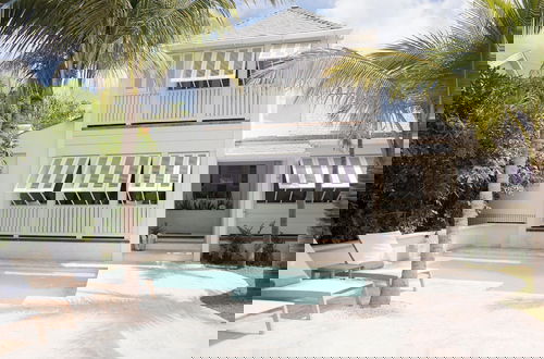 Photo 12 - Beachfront Bliss: Luxury Dunmore Town Home With Pool