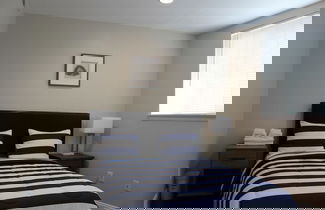 Photo 3 - Cozy 3 Bedroom/Great Location