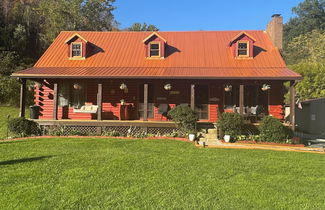 Photo 1 - Log Cabin in the Field