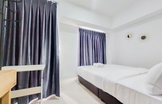 Foto 2 - Homey And Cozy Stay 1Br Tamansari Bintaro Mansion Apartment