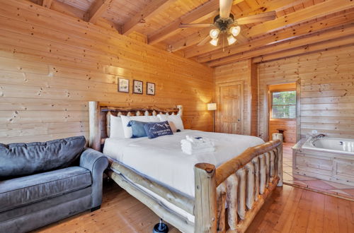 Photo 17 - Cabin w/ Theater, Games & Hot Tub! Sleeps 30