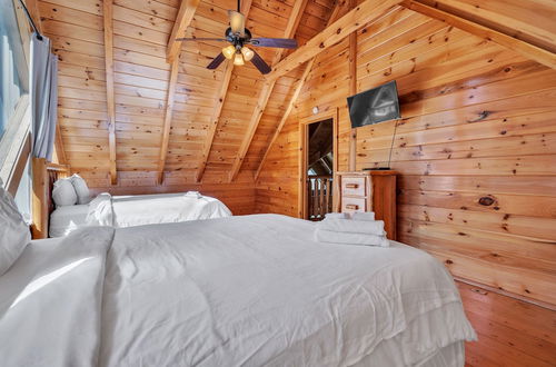 Photo 23 - Cabin w/ Theater, Games & Hot Tub! Sleeps 30