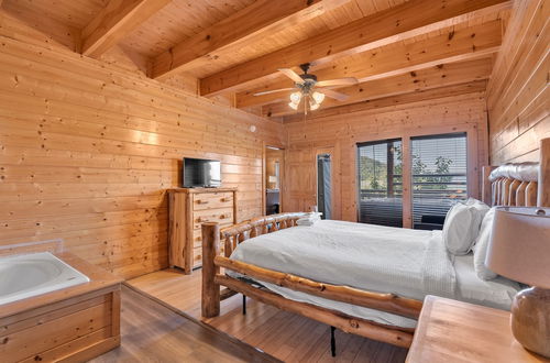 Photo 7 - Cabin w/ Theater, Games & Hot Tub! Sleeps 30