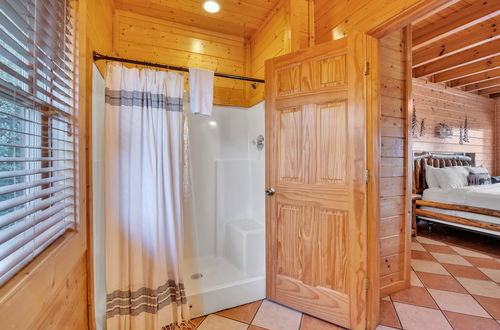 Photo 15 - Cabin w/ Theater, Games & Hot Tub! Sleeps 30