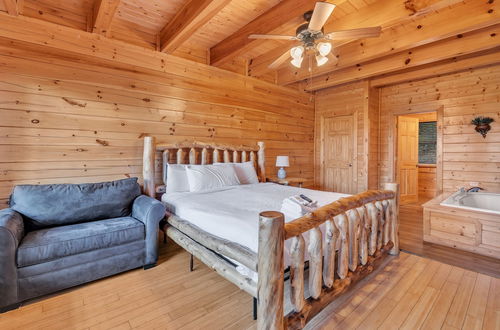 Photo 22 - Cabin w/ Theater, Games & Hot Tub! Sleeps 30