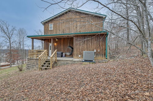 Photo 16 - Bee Spring Cabin w/ Arcade Game: Steps to Lake