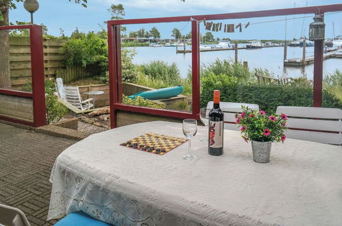 Photo 12 - 2 Pers. House König Lakeside of the Lauwersmeer With own Fishing Pier Sauna