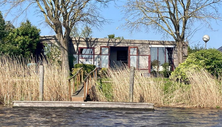 Photo 1 - 2 Pers. House König Lakeside of the Lauwersmeer With own Fishing Pier Sauna