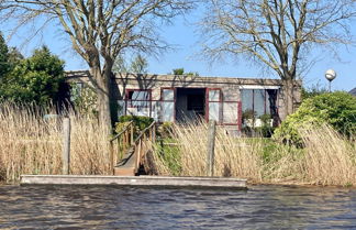 Photo 1 - 2 Pers. House König Lakeside of the Lauwersmeer With own Fishing Pier Sauna