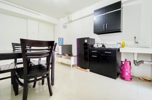 Foto 8 - Scenic 2Br With City View At Bassura City Apartment