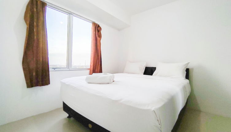 Photo 1 - Scenic 2Br With City View At Bassura City Apartment