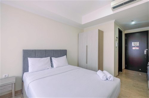 Photo 5 - Warm and Cozy Studio Room at Menteng Park Apartment