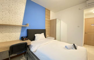 Foto 1 - Smart Studio Room Semi Apartment at The Lodge Paskal near BINUS University