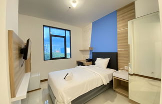 Photo 3 - Smart Studio Room Semi Apartment at The Lodge Paskal near BINUS University