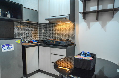 Photo 10 - Modern 2BR Puri Park View Apartment Near Lippo Puri