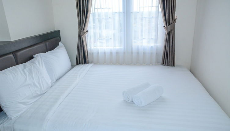 Photo 1 - Modern 2BR Puri Park View Apartment Near Lippo Puri