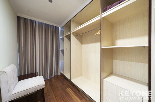 Foto 8 - KOHH – 2BR + Maids Room in Grandeur Residences