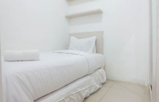 Photo 3 - Warm and Cozy 2BR Green Pramuka Apartment near Mall