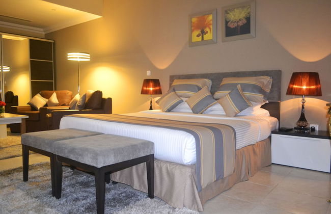 Magnum Hotel & Suites West Bay - Photo 7