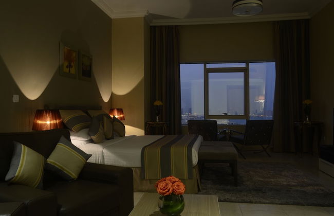 Magnum Hotel & Suites West Bay - Photo 12