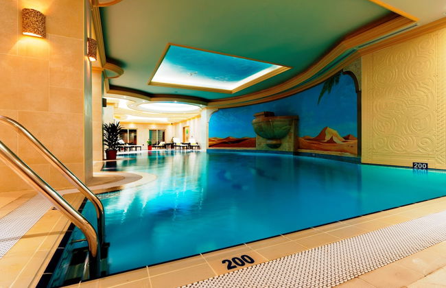 Magnum Hotel & Suites West Bay - Photo 15