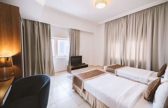 Magnum Hotel & Suites West Bay - Photo 11