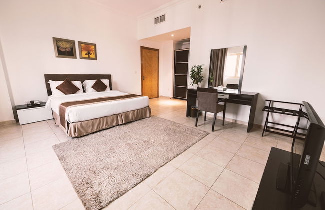 Magnum Hotel & Suites West Bay - Photo 10