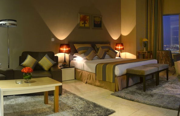 Magnum Hotel & Suites West Bay - Photo 5