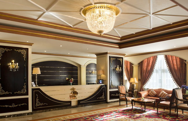 Magnum Hotel & Suites West Bay - Photo 2