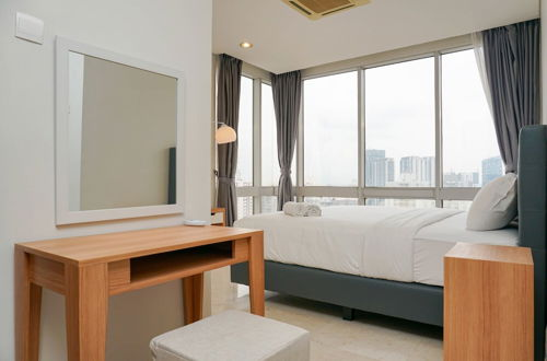 Photo 4 - Relaxing 2BR at The Empyreal Condominium Epicentrum Apartment By Travelio