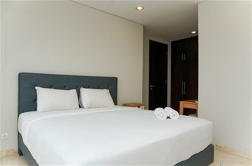 Photo 3 - Relaxing 2BR at The Empyreal Condominium Epicentrum Apartment By Travelio