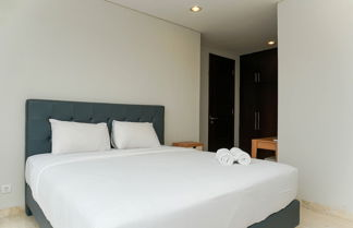 Foto 3 - Relaxing 2BR at The Empyreal Condominium Epicentrum Apartment By Travelio