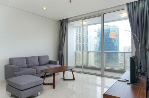 Photo 12 - Elegant 2BR at The Empyreal Condominium Epicentrum Apartment