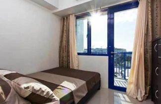 Photo 1 - 1 Bedroom Condo at Sea Residences by JC