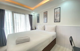 Photo 3 - Gorgeous Studio Room At Grand Asia Afrika Apartment