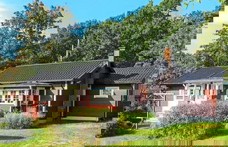 Foto 1 - 8 Person Holiday Home in Vackelsang
