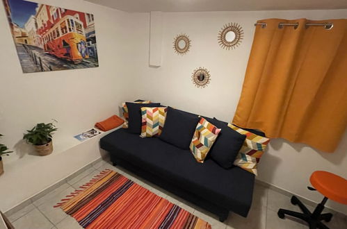 Photo 2 - Cozy Furnished Basement Apartment