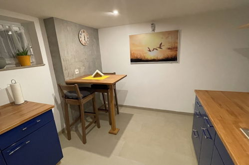 Photo 12 - Cozy Furnished Basement Apartment