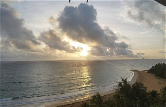 Foto 1 - Beach Apartment With Amazing Sunrises