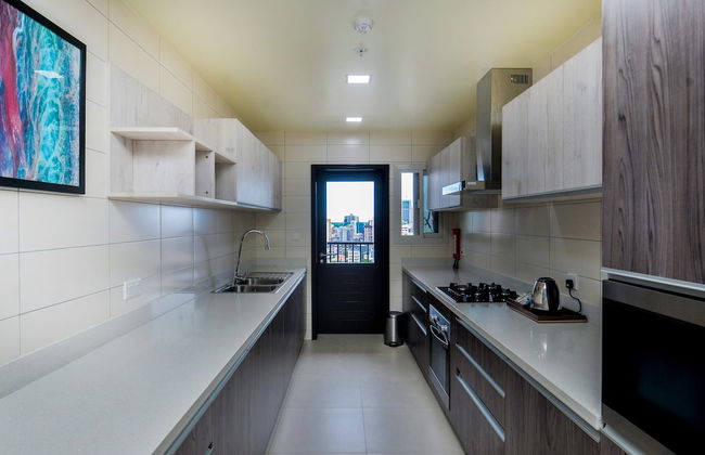 AURA SUITES - Photo 8