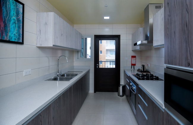 AURA SUITES - Photo 7