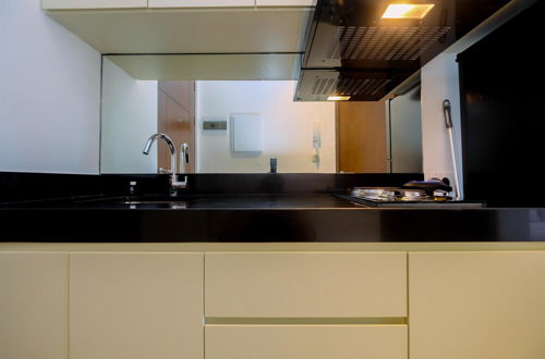 Photo 8 - Great Deal Studio Apartment at The Newton Ciputra World 2