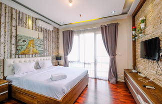 Photo 1 - Comfort And Modern Look Studio Apartment At Ambassade Kuningan