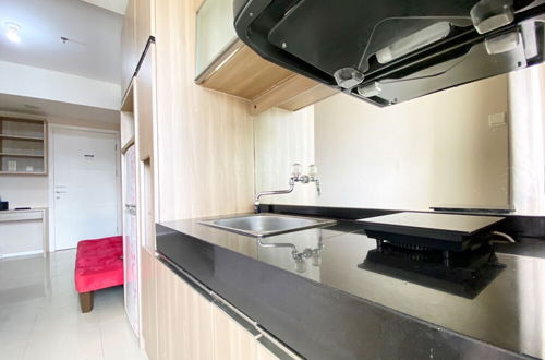 Photo 9 - Cozy And Clean 1Br Apartment At Parahyangan Residence