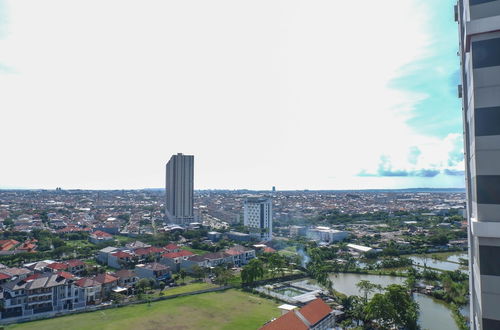 Photo 15 - Minimalist Modern Studio Room Apartment At Taman Melati