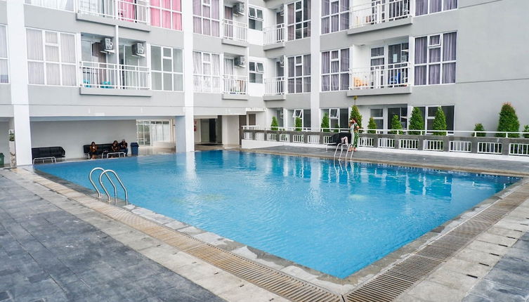 Photo 1 - Best Price 2Br With Pool View Apartment At Taman Melati Surabaya